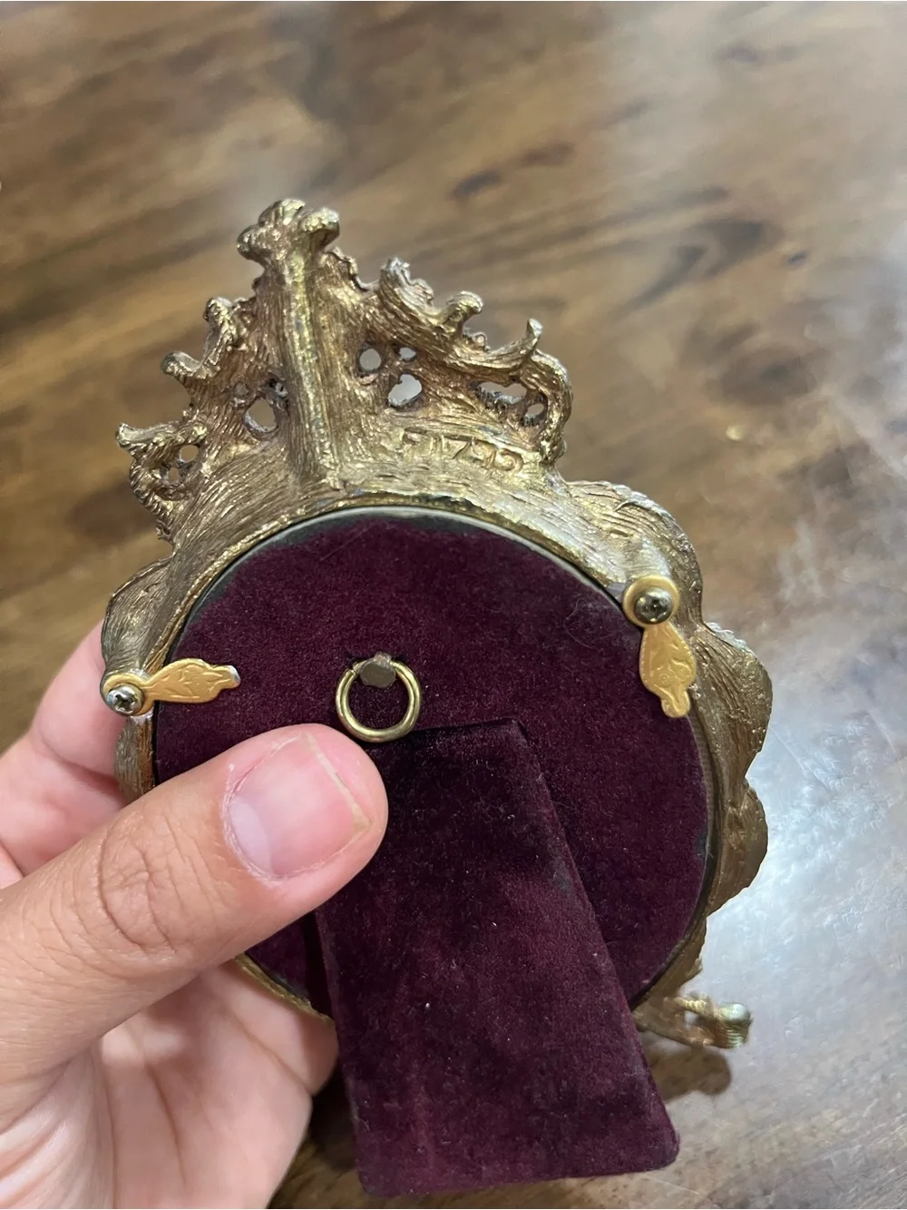 Vintage gold plated oval frame with glass.